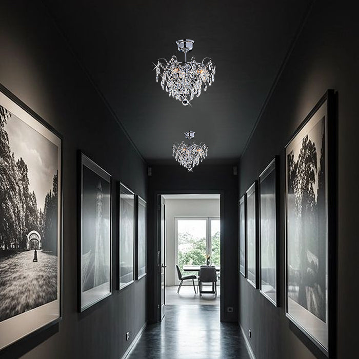 Dark hallway with framed pictures ochandeliers hanging from the ceiling auckalnd