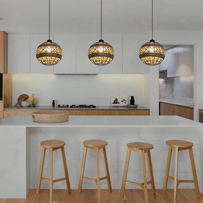 Three modern pendant lights with a round shape above kitchen island nz