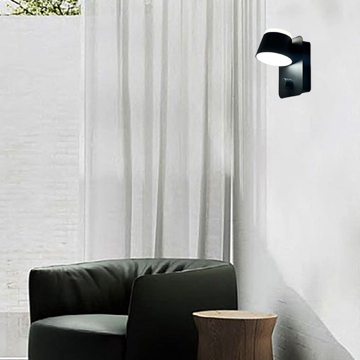 Modern outdoor setting with a black wall light fixture in livingroom NZ