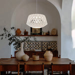 Dining room with a modern wooden pendant light west auckland