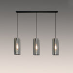 A contemporary pendant light with three cylindrical glass shades west auckland