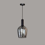 A pendant light with a smoke glass shade and black top west auckland