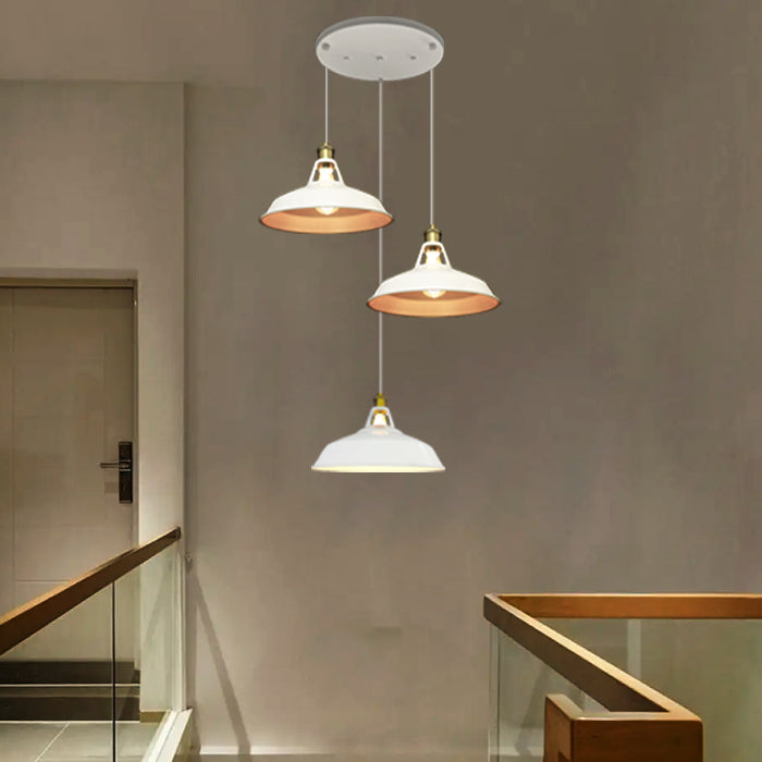 Three pendant lights hanging in a modern interior setting west auckland