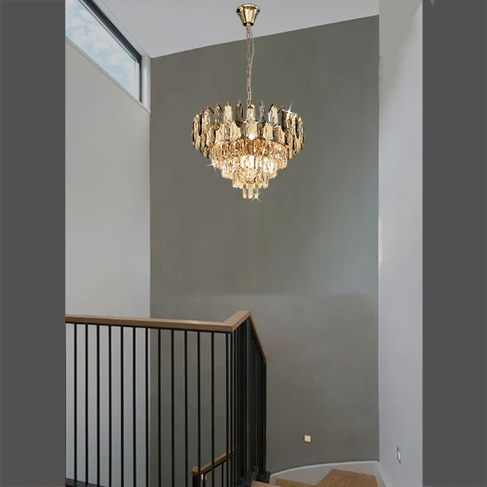 Chandelier hanging in a modern  staircase NZ