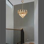 Chandelier hanging in a modern  staircase NZ