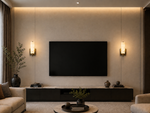 A modern living room interior featuring a large black flat-screen TV mounted on a beige textured wall above a dark media console. Symmetrical wall sconces with warm glowing glass shades flank the TV, with decorative vases and a plant on the console.