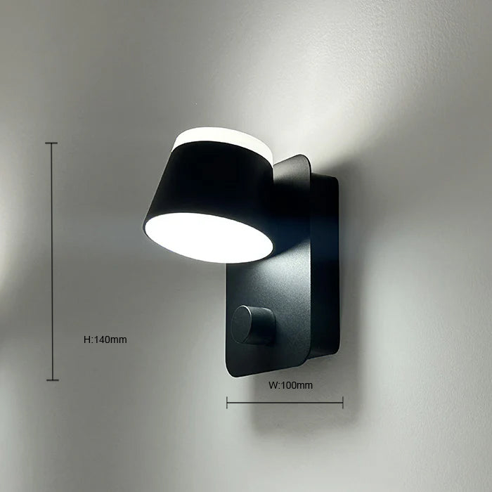Black wall-mounted light fixture with dimensions in the barthoom