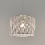 hanging light fixture with wicker-like design  above dinning table nz