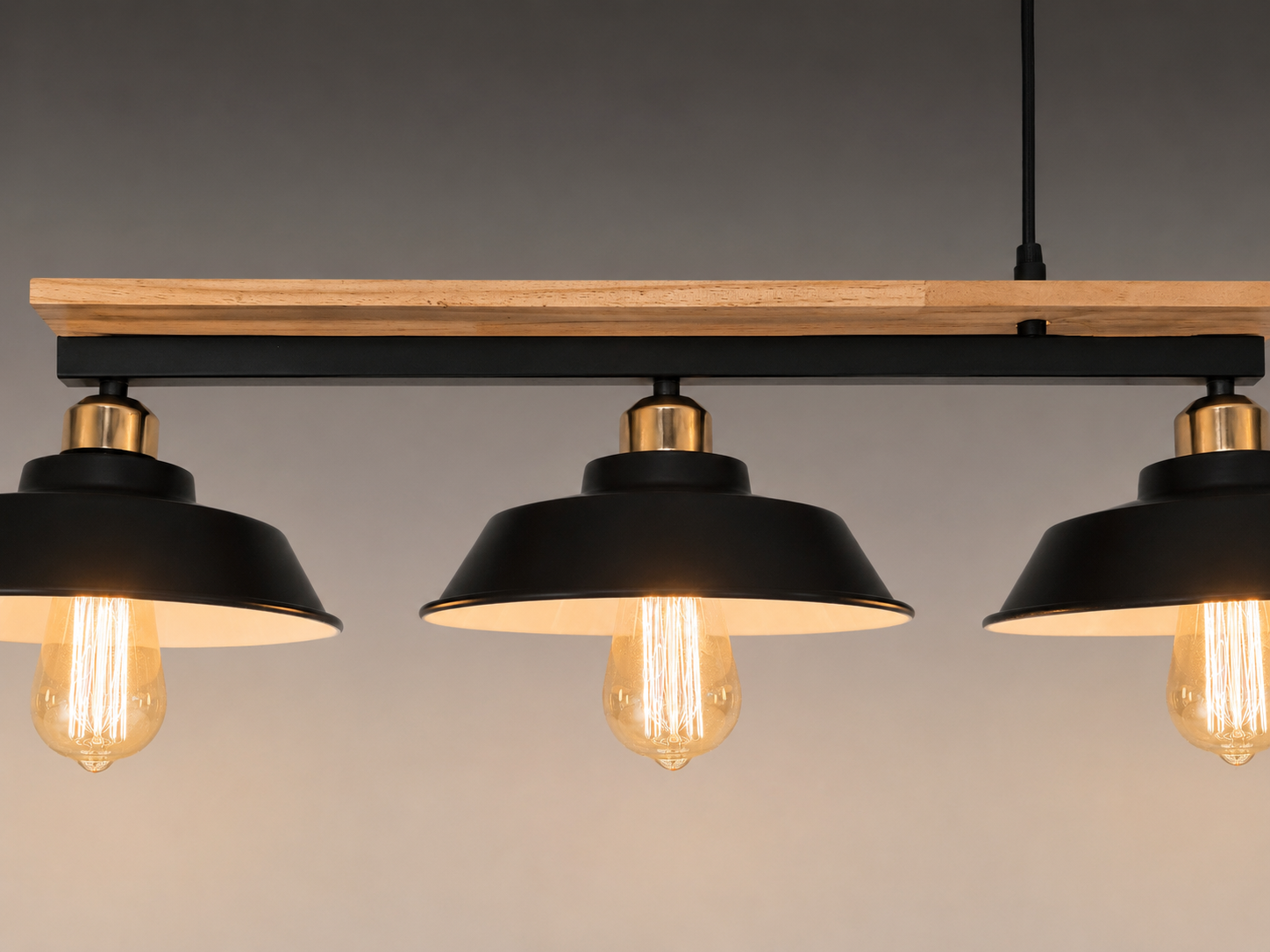 pendant light fixture with black lampshades and exposed bulbs 