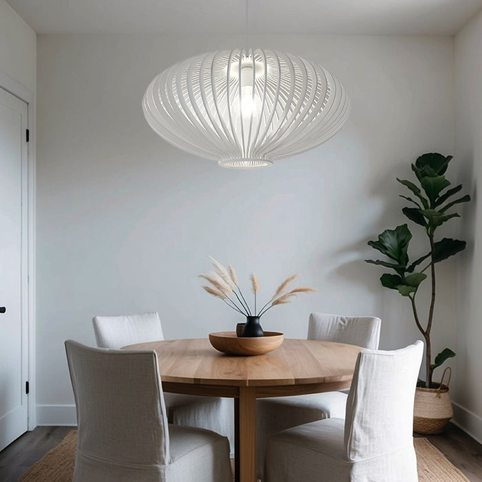 Dining room with a round wooden table light west auckland edenligjting 