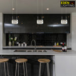 Modern kitchen with crystal pendant lights above island nz