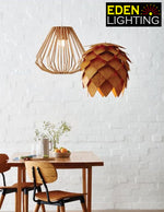 Natural wood pendant light hanging over a dining table in living room NZ